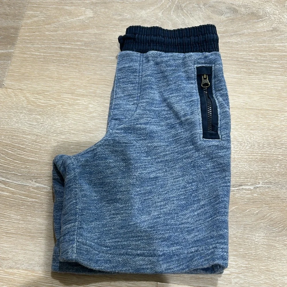 Baby Gap soft blue shorts with zipper pockets accented with dark blue! Size 4